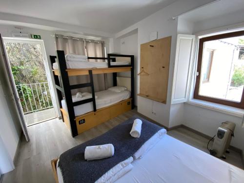 AMAZIGH HOSTEL ensuite Rooms & Dorms with self-catering Kitchenにあるベッド