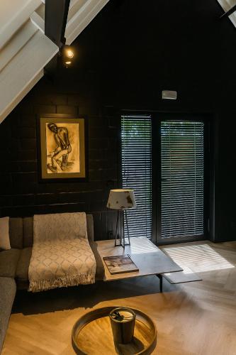 Χώρος καθιστικού στο Cosy apartment with garden
