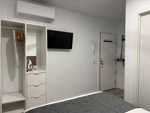 TV o dispositivi per l'intrattenimento presso PlazaMayorSuites