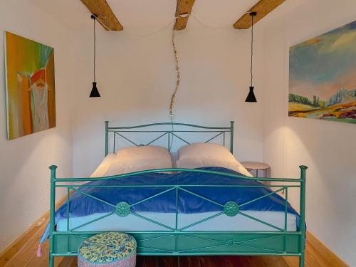 Postel nebo postele na pokoji v ubytování Haus Der Malerin Andrea Gawaz