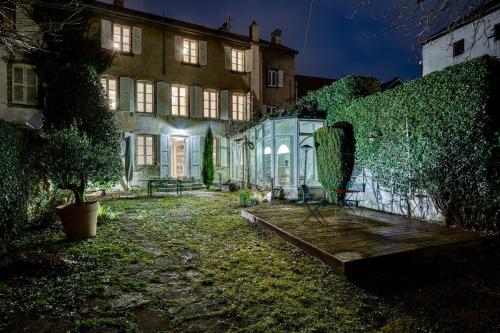 a large building with a garden in front of it at Bedroom 6 - Unique Experience - COLIVING in Ferney-Voltaire