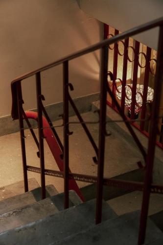 a stair railing with a skateboard on top of it at 眷村1954 Guest House in Taipei