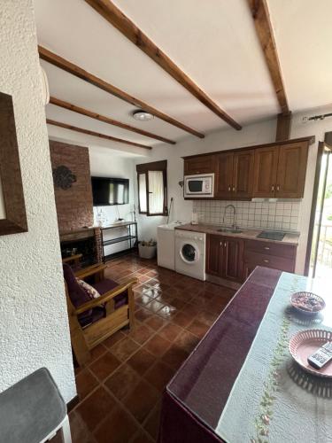 Η κουζίνα ή μικρή κουζίνα στο Aptos El Manantial Burunchel