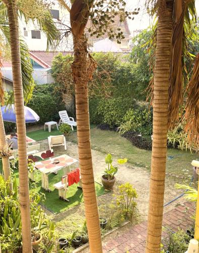Κήπος έξω από το Golf-Sea-City Guest House