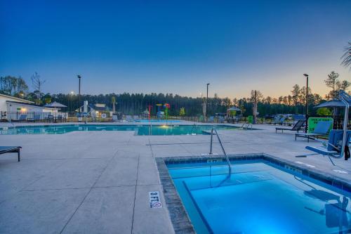 a large swimming pool with a swimming pool at Savannah Lakes RV Resort in Hardeeville