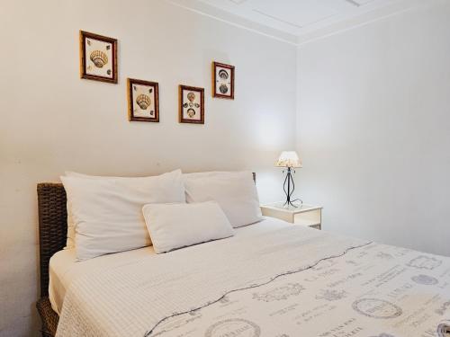 Letto o letti in una camera di Pousada Noantri