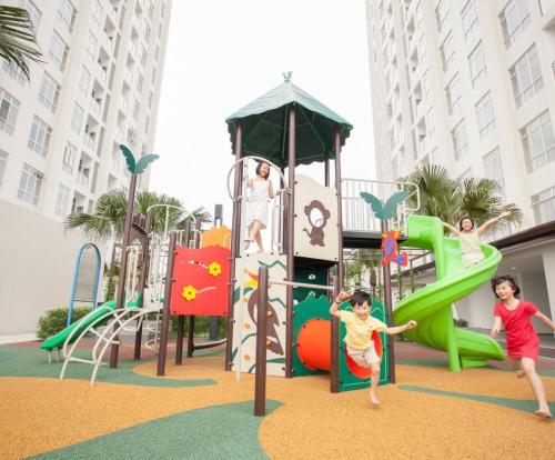 a group of children playing on a playground at The JB House - A 5 Star Quality Home At Iskandar Puteri in Gelang Patah