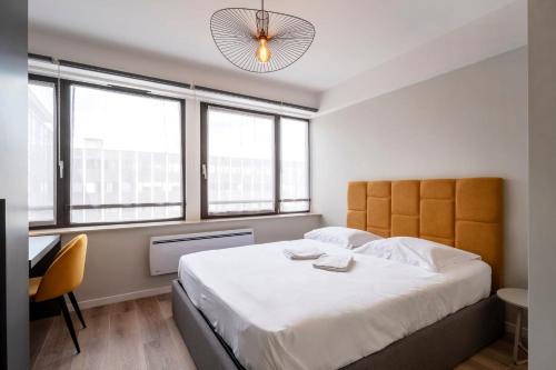 Llit o llits en una habitació de Le Saint-Jacques