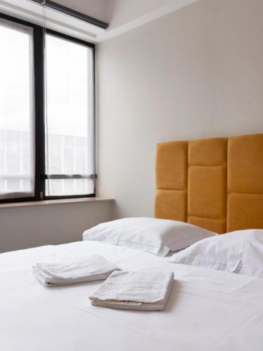 Llit o llits en una habitació de Le Saint-Jacques