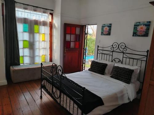 Letto o letti in una camera di 84 on Fourth Guest House