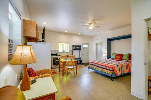 a living room with a bed and a table at Fish, Raft and Hike Southwest OR Couples Retreat! in Trail