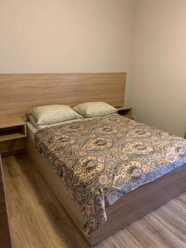 Postel nebo postele na pokoji v ubytování Каприз