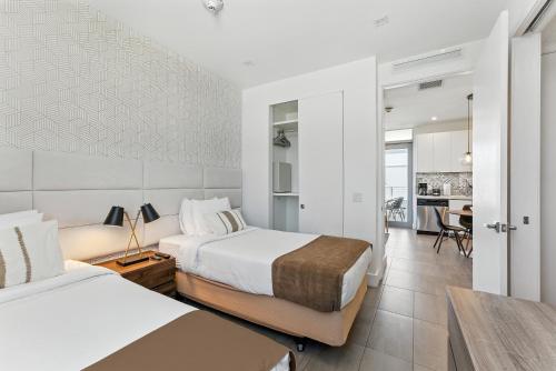 Ένα ή περισσότερα κρεβάτια σε δωμάτιο στο MILLA South Beach