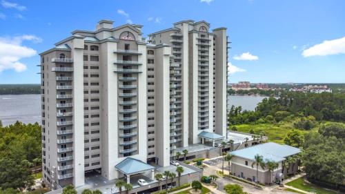 an aerial view of two tall apartment buildings at Beautiful Orlando Lakefront Condo 5 MINUTES FROM DISNEY in Orlando