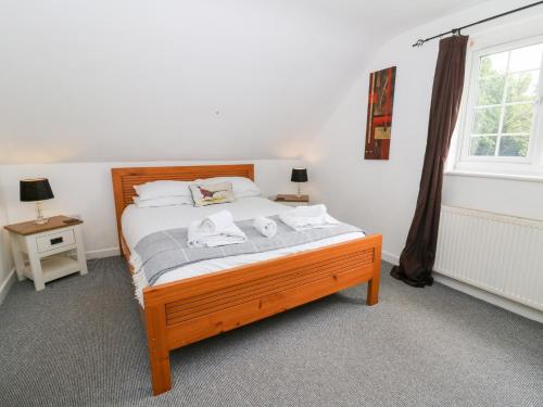 Postel nebo postele na pokoji v ubytování Cariad Cottage