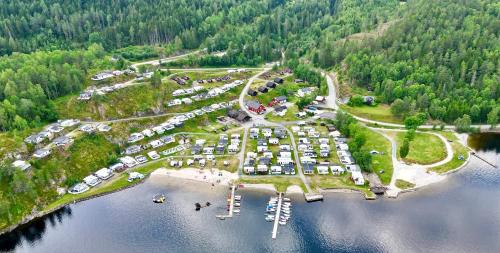 an aerial view of a parking lot next to the water at Garvikstrondi Camping in Seljord