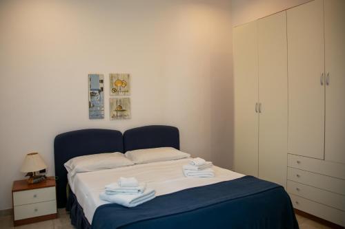 Ένα ή περισσότερα κρεβάτια σε δωμάτιο στο Hibiscus B&B