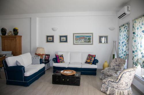 Χώρος καθιστικού στο Hibiscus B&B