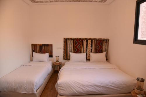 Ένα ή περισσότερα κρεβάτια σε δωμάτιο στο Auberge Prince