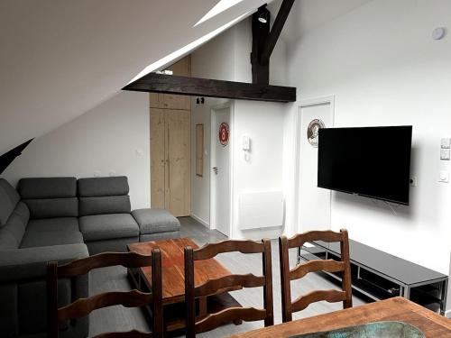 Μια τηλεόραση ή/και κέντρο ψυχαγωγίας στο apartment Family