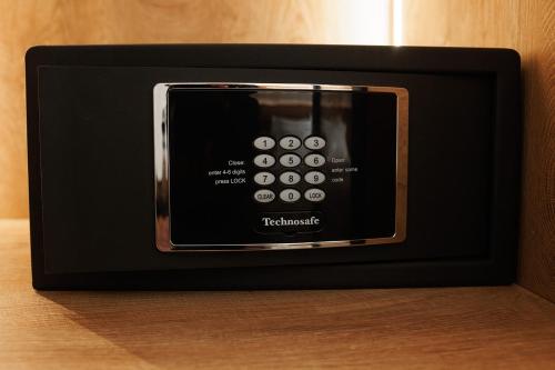 a microwave oven sitting on top of a table at GkF Luxury Villas in Naxos Chora