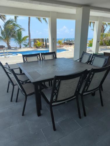 a black table and chairs on a patio at Horizon in Marathon