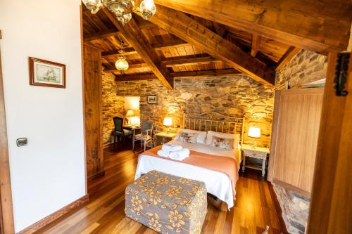 Ένα ή περισσότερα κρεβάτια σε δωμάτιο στο Casa do Morcego