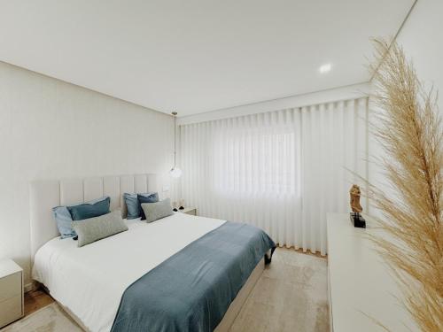 Ένα ή περισσότερα κρεβάτια σε δωμάτιο στο Seanest View Apartment