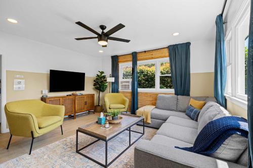a living room with a couch and a tv at No bad days in San Diego in San Diego