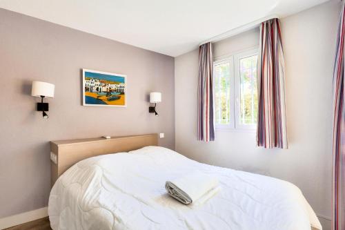 Postel nebo postele na pokoji v ubytování Résidence La Pinède - maeva Home - Appartement bord de mer 2 pièces + coin cabine 6 personnes - Prestige MAE-7691