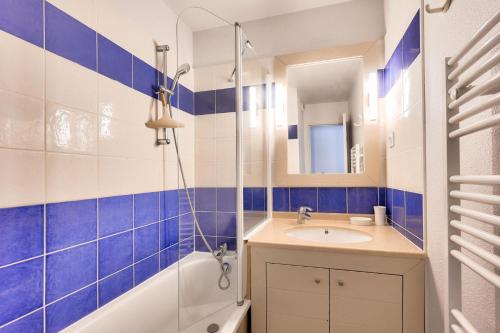 Koupelna v ubytování Résidence La Pinède - maeva Home - Appartement bord de mer 2 pièces + coin cabine 6 personnes - Prestige MAE-7691