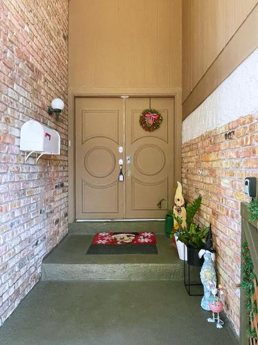 a front door of a house with a mat on it at Happy Home in Orlando