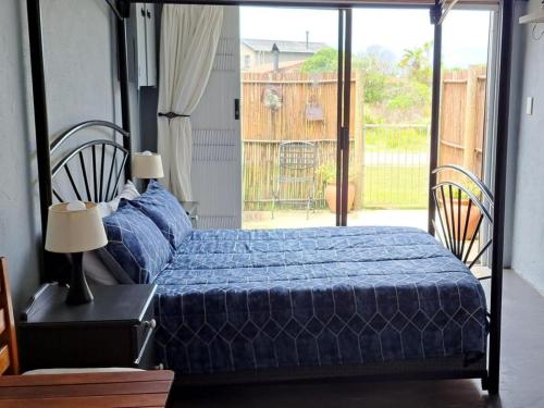 Ein Bett oder Betten in einem Zimmer der Unterkunft Pik 'n Wyntjie