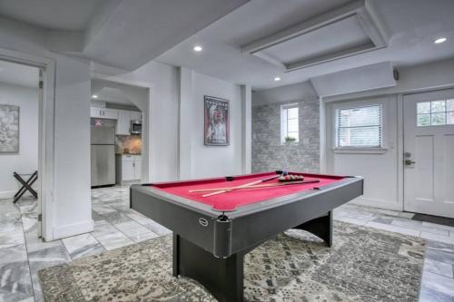 a billiard room with a red pool table at Buckhead 8BR GetawayOpen Layout,Ideal for Groups in Atlanta
