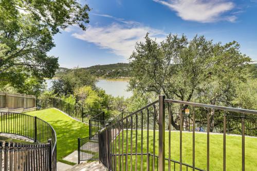 a staircase with a view of a lake at Lake Travis House with Private Dock, Pool and Hot Tub! in Leander
