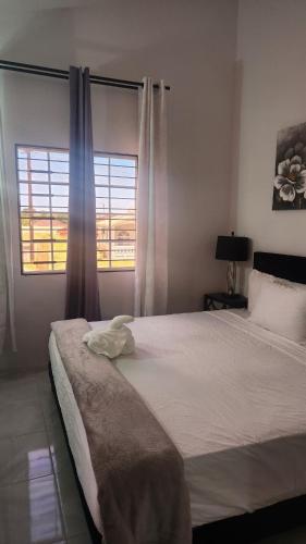 Llit o llits en una habitació de KV cozy escape