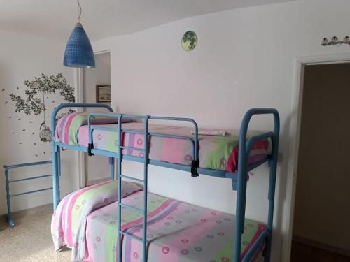 a couple of bunk beds in a room at La Casa del Castello in Alvito