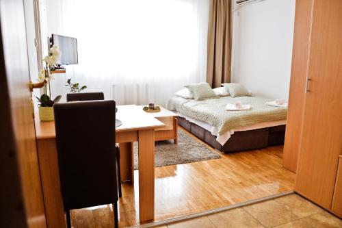 Postel nebo postele na pokoji v ubytování Iris