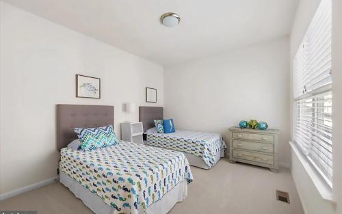 Ένα ή περισσότερα κρεβάτια σε δωμάτιο στο Beach House in Bethany Beach, DE