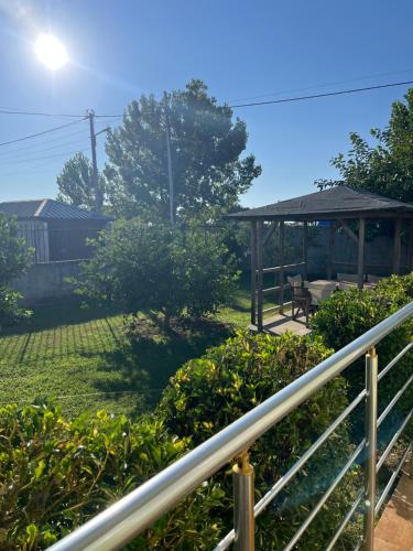 a view of a yard with a gazebo at OLIVE Home in Durrës