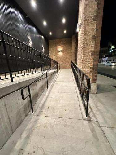a row of benches on a sidewalk in a building at River North Rooftop With In and Out Parking 1 in Chicago