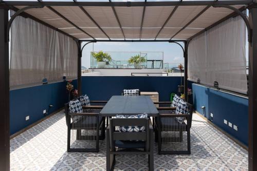 La Cuadra Apartments By Acomodoにあるバルコニーまたはテラス