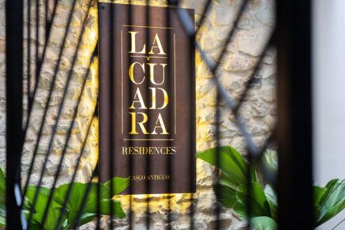 La Cuadra Apartments By Acomodoに飾ってある許可証、賞状、看板またはその他の書類