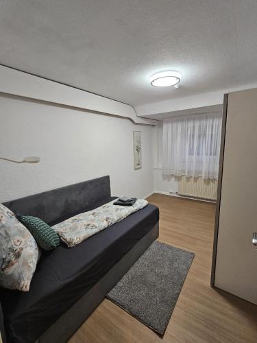 a living room with a couch in a room at Sea Berg in Friedrichshafen