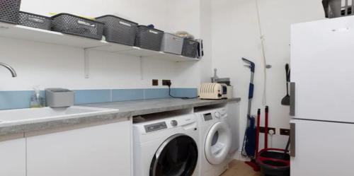 Kuchyň nebo kuchyňský kout v ubytování TalbachHouse PremiumHolidayHome