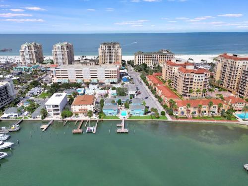 an aerial view of a city with a marina at Sunlit Condo Heated Pool across from Beach in Clearwater Beach
