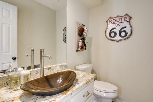 a bathroom with a copper sink on a counter at Private Pool and Game Room Upscale Home in Vinita in Vinita