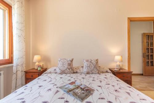 Una cama o camas en una habitación de La Proda