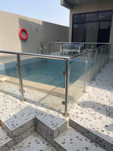 a swimming pool on top of a building at شالية موج 335 in Dhahran