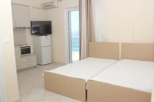 Fotografie z fotogalerie ubytování Sunset Apartments Berdenesh Sarandë v destinaci Sarandë